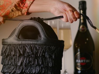 Black Raffia Minaudière: The Epitome of Timeless Elegance